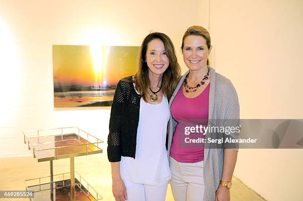 Annette Victoria and Annmarie Lind attend Andrew Levitas Metalwork Playground opening reception at Blueshift Wynwood on April 10, 2015 in Miami,...