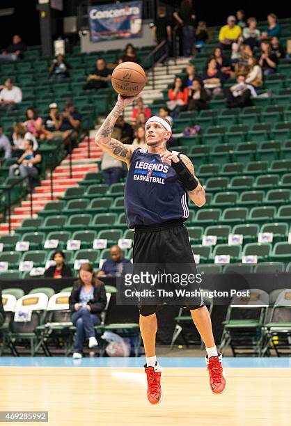 Texas Legends basketball player Delonte West takes a shot at the basket with his non-dominant hand during a solo pre-game workout at the Dr. Pepper...