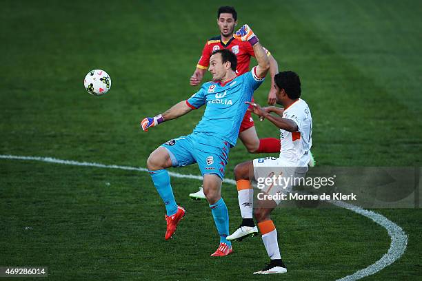 United goalkeeper Eugene Galekovic tries to save the ball after it bounced over his head during the round 25 A-League match between Adelaide United...