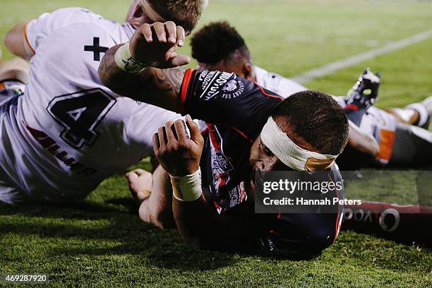 Manu Vatuvei of the Warriors celebrates after scoring a try during the round six NRL match between the New Zealand Warriors and the Wests Tigers at...