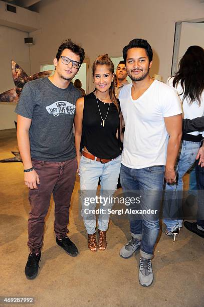 Virginia Lameba and guets attend Andrew Levitas Metalwork Playground opening reception at Blueshift Wynwood on April 10, 2015 in Miami, Florida.