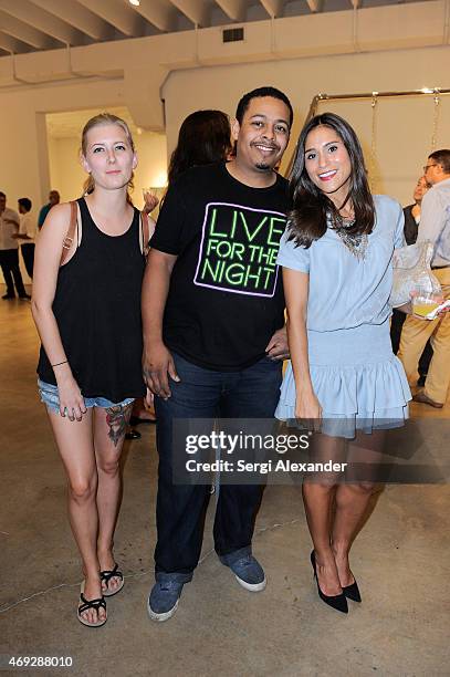 Lisa Demarco and guests attend Andrew Levitas Metalwork Playground opening reception at Blueshift Wynwood on April 10, 2015 in Miami, Florida.