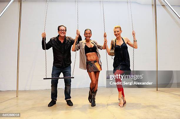 Artist Sylvie Robert and Sky Palma attend Andrew Levitas Metalwork Playground opening reception at Blueshift Wynwood on April 10, 2015 in Miami,...