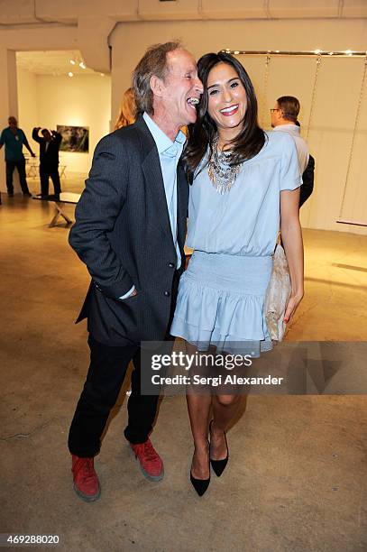 William Chewning and Lisa Demarco attend Andrew Levitas Metalwork Playground opening reception at Blueshift Wynwood on April 10, 2015 in Miami,...