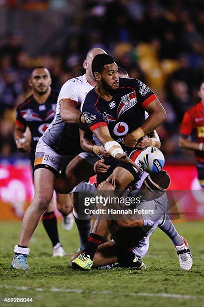 Sam Lisone of the Warriors looks to offload the ball during the round six NRL match between the New Zealand Warriors and the Wests Tigers at Mt Smart...