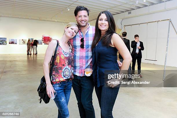 Laurie Warriner, Nicholas Mancini and Marcela Coutts attend Andrew Levitas Metalwork Playground opening reception at Blueshift Wynwood on April 10,...