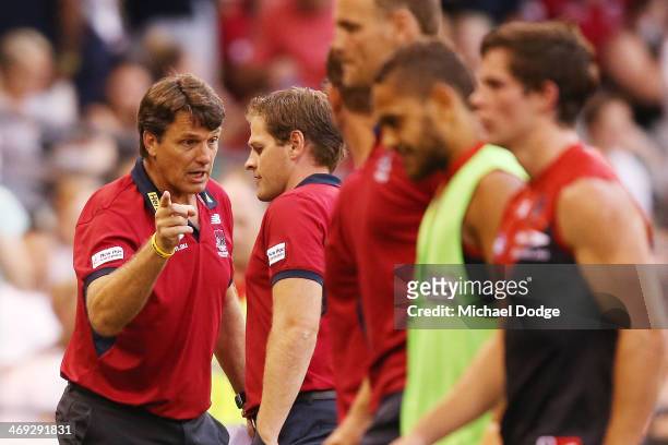 Demons coach Paul Roos gestures to Josh Mahoney during the round one AFL NAB Challenge Cup match between the Richmond Tigers and the Melbourne Demons...
