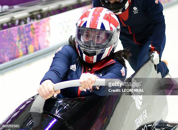 Great Britain-1, two-woman bobsleigh steered by Paula Walker takes a practice run at the Sanki Sliding Centre in Rosa Khutor on February 14, 2014...