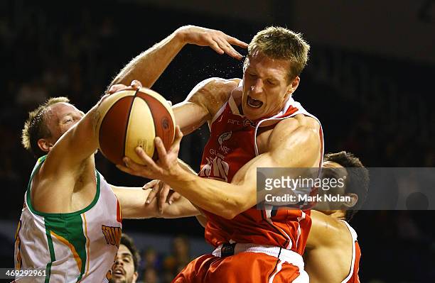 David Gruber of the Hawks rebounds during the round 18 NBL match between the Wollongong Hawks and the Townsville Crocodiles at Wollongong...