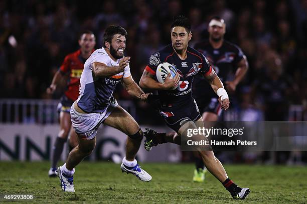 Shaun Johnson of the Warriors makes a break during the round six NRL match between the New Zealand Warriors and the Wests Tigers at Mt Smart Stadium...