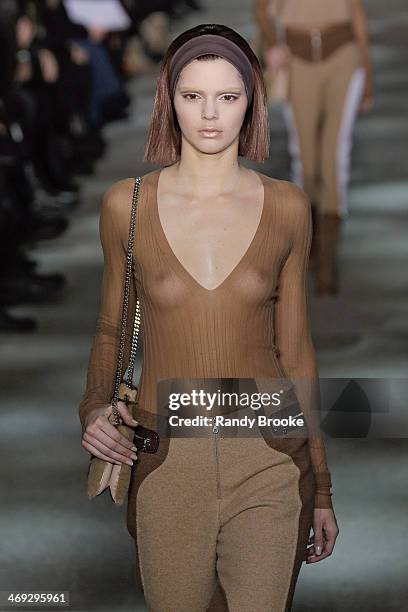 Model Kendall Jenner walks the runway at Marc Jacobs during Mercedes-Benz Fashion Week Fall 2014 at Lexington Avenue Armory on February 13, 2014 in...