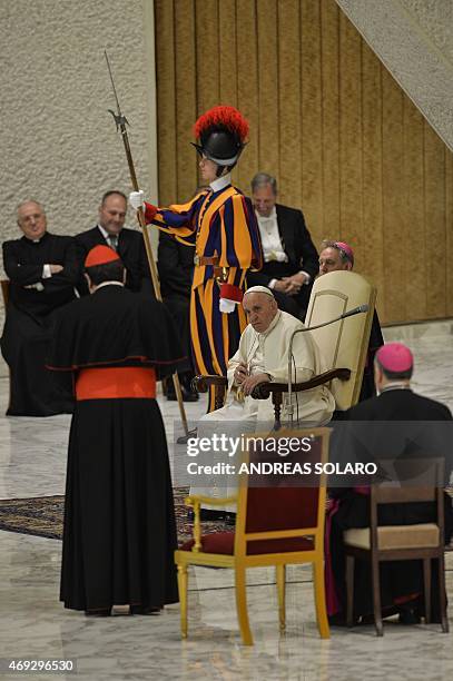 Pope Francis looks to cardinal Joau Braz de Aviz, during his meeting with members of Istituti di Vita Consacrata and Società di Vita Apostolica , in...