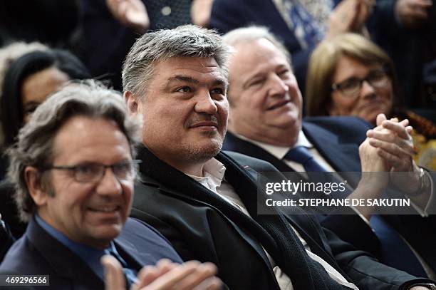 French right-wing party UMP general delegate David Douillet and MP Frederic Lefebvre attend a meeting ahead of the regional elections in Ile-de...