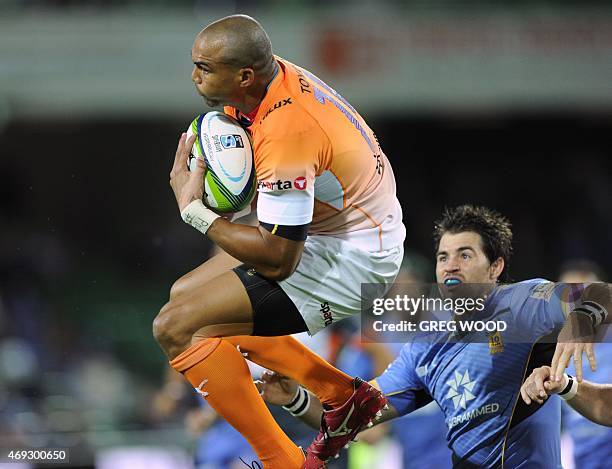 Cornal Hendricks from the Cheetahs collects the ball during the Super 15 rugby union match between Australias Western Force and South Africas...