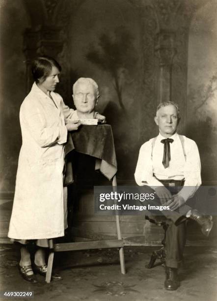 Female sculptor with one of her works, and the model for it, circa 1915. Possibly Kathleen Scott, nee Bruce, later Lady Hilton Young, the wife of...