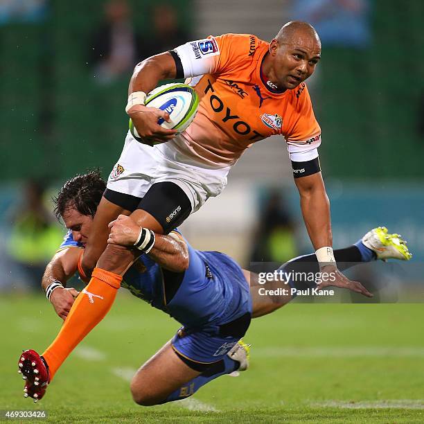 Cornal Hendricks of the Cheetahs gets tackled by Sias Ebersohn of the Force during the round nine Super Rugby match between the Force and the...