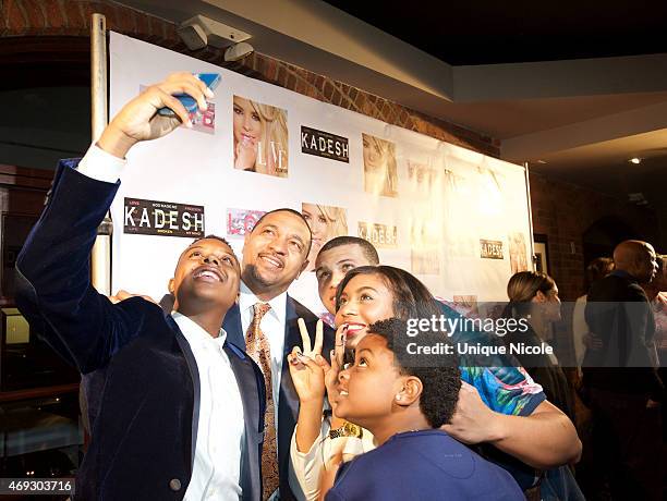 Christian Jackson, Mark Jackson, Mark Jackson Jr, Heavyn Jackson and Micah Jackson take a selfie on the red carpet at the Private Listening Party For...