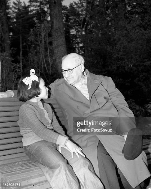 Russia, Center, Moscow Region, 1960s: Aircraft designer Andrey Tupolev with his granddaughter, 1963.