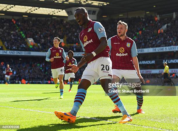 Christian Benteke of Aston Villa celebrates scoring their first goal with Tom Cleverley of Aston Villa during the Barclays Premier League match...