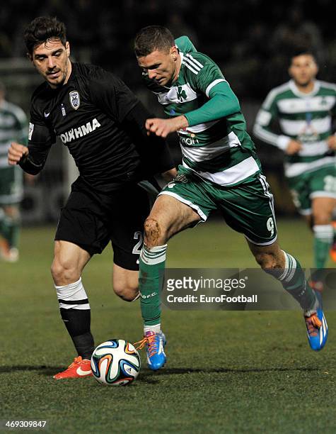 Markus Berg of Panathinaikos fights for the ball with Kostas Katsouranis of PAOK during the Greek Superleague between Panathinaikos and PAOK at the...
