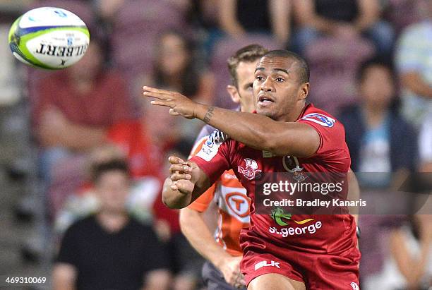 Will Genia of the Reds passes the ball during the Super Rugby trial match between the Queensland Reds and the Melbourne Rebels at Ballymore Stadium...