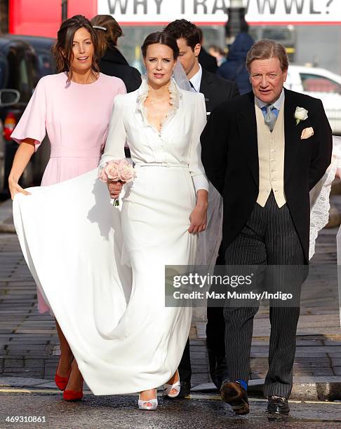 Arabella Musgrave accompanied by her father Nicholas Musgrave arrives at St Paul's Church, Knightsbridge for her wedding to George Galliers-Pratt on...