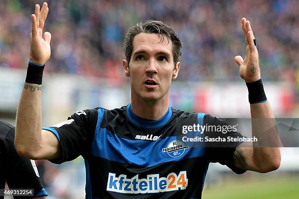 Srdjan Lakic of Paderborn celebrates after scoring his team's second goal during the Bundesliga match between SC Paderborn 07 and FC Augsburg at...