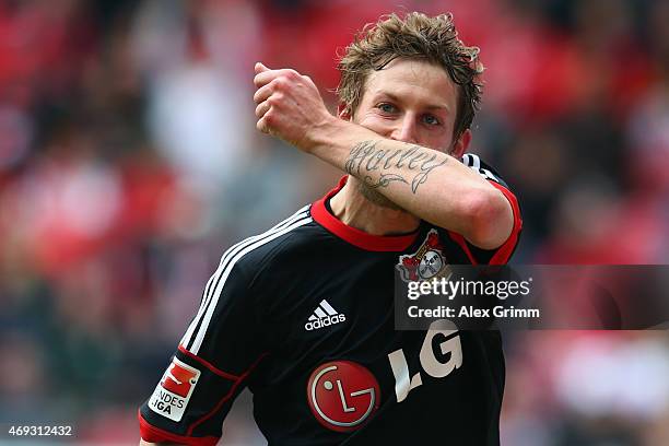 Stefan Kiessling of Leverkusen celebrates his team's second goal during the Bundesliga match between 1. FSV Mainz 05 and Bayer 04 Leverkusen at...