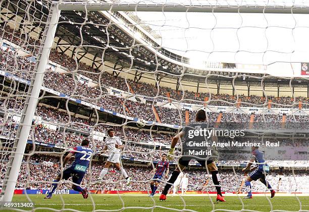 Javier 'Chicharito' Hernandez of Real Madrid heads the ball to score his team's second goal during the La Liga match between Real Madrid CF and Eibar...