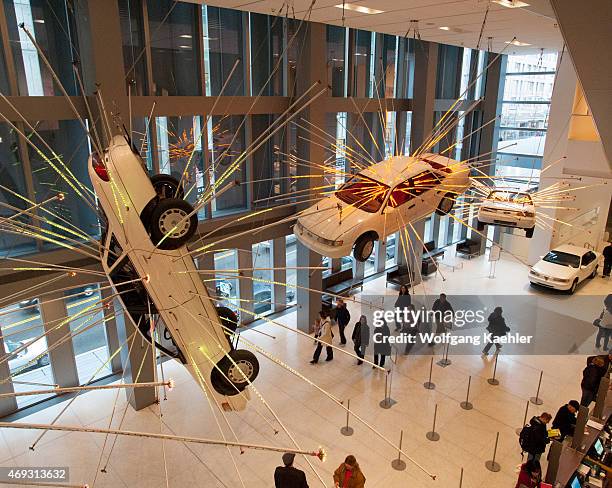 Inopportune: Stage One, from 2004, is a large-scale installation work consisting of a meticulous arrangement of life-size cars and multichannel tubes...