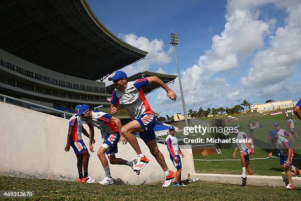 James Anderson and Adam Lyth during a hill shuttle sprint session during the England nets session at the Sir Vivian Richards Stadium on April 11,...