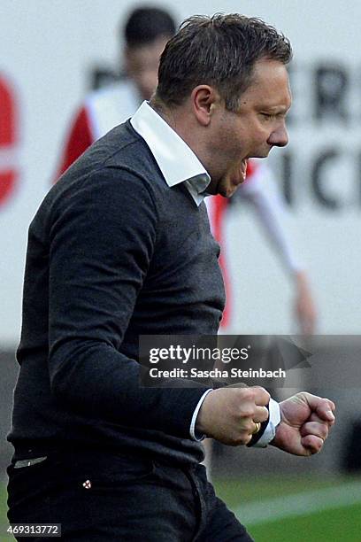 Head coach Andre Breitenreiter of Paderborn reacts after winning the Bundesliga match against FC Augsburg at Benteler Arena on April 11, 2015 in...