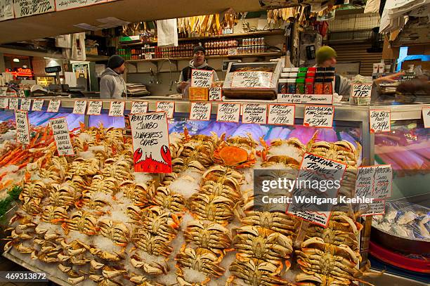 Fresh Dungeness crab for sale at the Pike Place Market in Seattle, Washington State, USA.