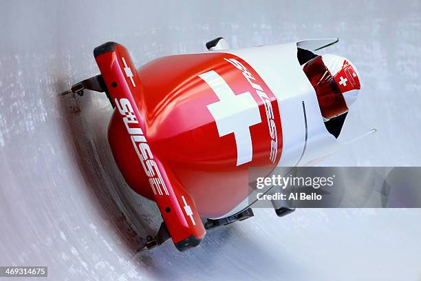 Caroline Spahni of Switzerland pilots a run during a Women's Bobsleigh training session on day 7 of the Sochi 2014 Winter Olympics at the Sanki...