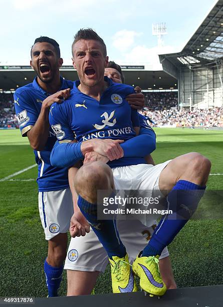 Jamie Vardy of Leicester City celebrates scoring their third goal with team mates during the Barclays Premier League match between West Bromwich...