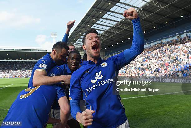 David Nugent of Leicester City celebrates with teammates after the late Vardy goal during the Barclays Premier League match between West Bromwich...