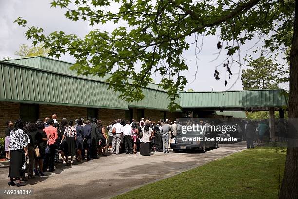 Mourners wait to enter the W.O.R.D. Ministries Christian Center for the funeral of Walter Scott, after he was fatally shot by a North Charleston...