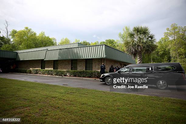 The hearse carrying Walter Scott arrives arrives at the W.O.R.D. Ministries Christian Center for his funeral, after he was fatally shot by a North...