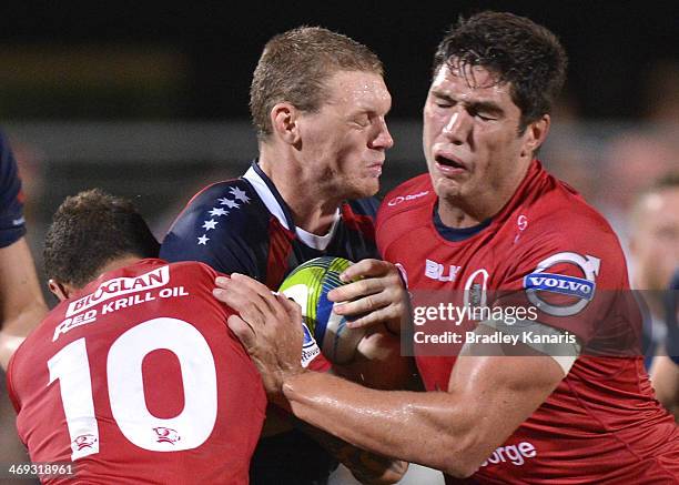 Bryce Hegarty of the Rebels takes on the defence during the Super Rugby trial match between the Queensland Reds and the Melbourne Rebels at Ballymore...