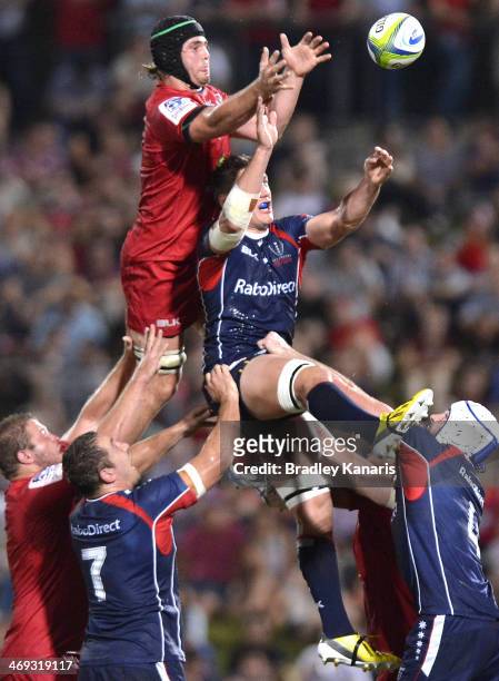 Liam Gill of the Reds and Sean McMahon of the Rebels compete at the lineout during the Super Rugby trial match between the Queensland Reds and the...