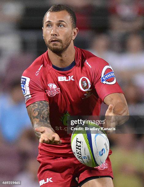 Quade Cooper of the Reds passes the ball during the Super Rugby trial match between the Queensland Reds and the Melbourne Rebels at Ballymore Stadium...