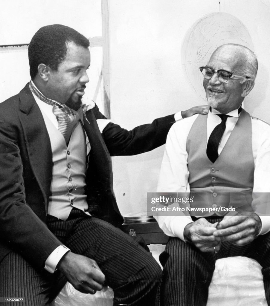 The founder of Motown records, Berry Gordy seated with his father