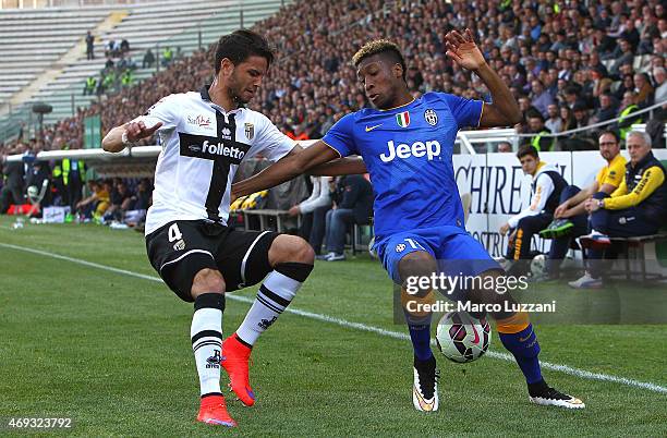 Kingsley Coman of Juventus FC competes for the ball with Pedro Mendes of Parma FC during the Serie A match between Parma FC and Juventus FC at Stadio...