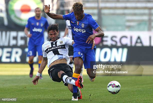 Kingsley Coman of Juventus FC competes for the ball with Pedro Mendes of Parma FC during the Serie A match between Parma FC and Juventus FC at Stadio...