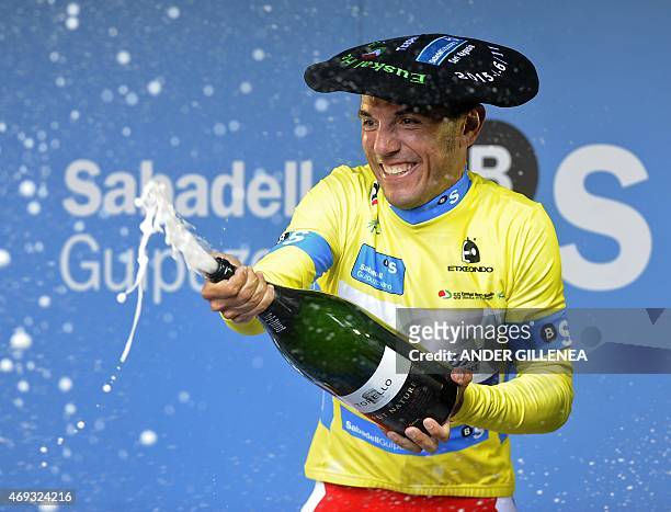 Katusha's Spanish rider Joaquim Rodriguez celebrates his victory on the podium of the last stage of the Tour of the Basque Country in Aia, northern...