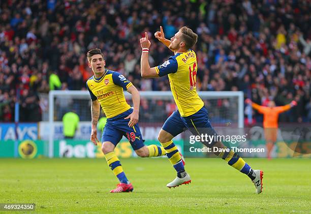 Aaron Ramsey of Arsenal celebrates scoring the opening goal with Hector Bellerin of Arsenal during the Barclays Premier League match between Burnley...