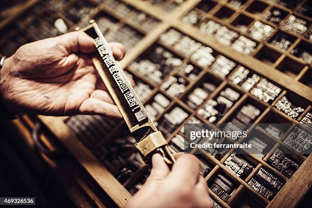 typesetting for letterpress printing - typesetter stock pictures, royalty-free photos & images