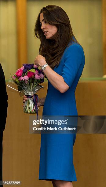 Catherine, Duchess of Cambridge attends the opening of the ICAP Art Room at Northolt High School on February 14, 2014 in Ealing, England.