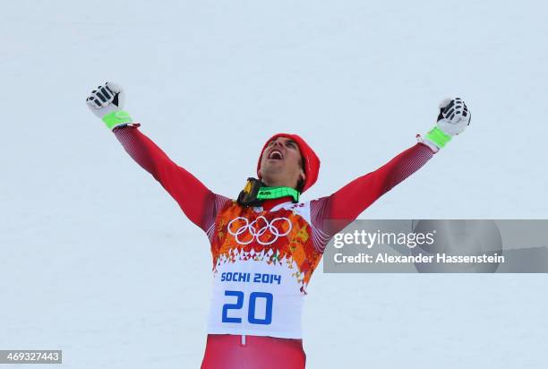 Gold medalist Sandro Viletta of Switzerland celebrates during the flower ceremony for the Alpine Skiing Men's Super Combined Downhill on day 7 of the...