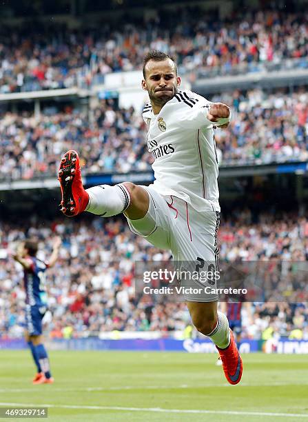 Jese Rodriguez of Real Madrid celebrates after scoring his team's third goal during the La Liga match between Real Madrid CF and Eibar at Estadio...